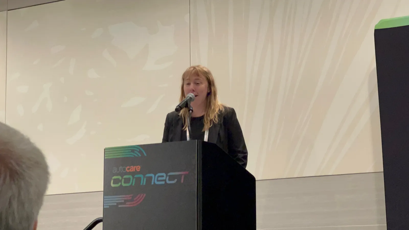 Lauren McCullough speaking at AutoCare Connect
