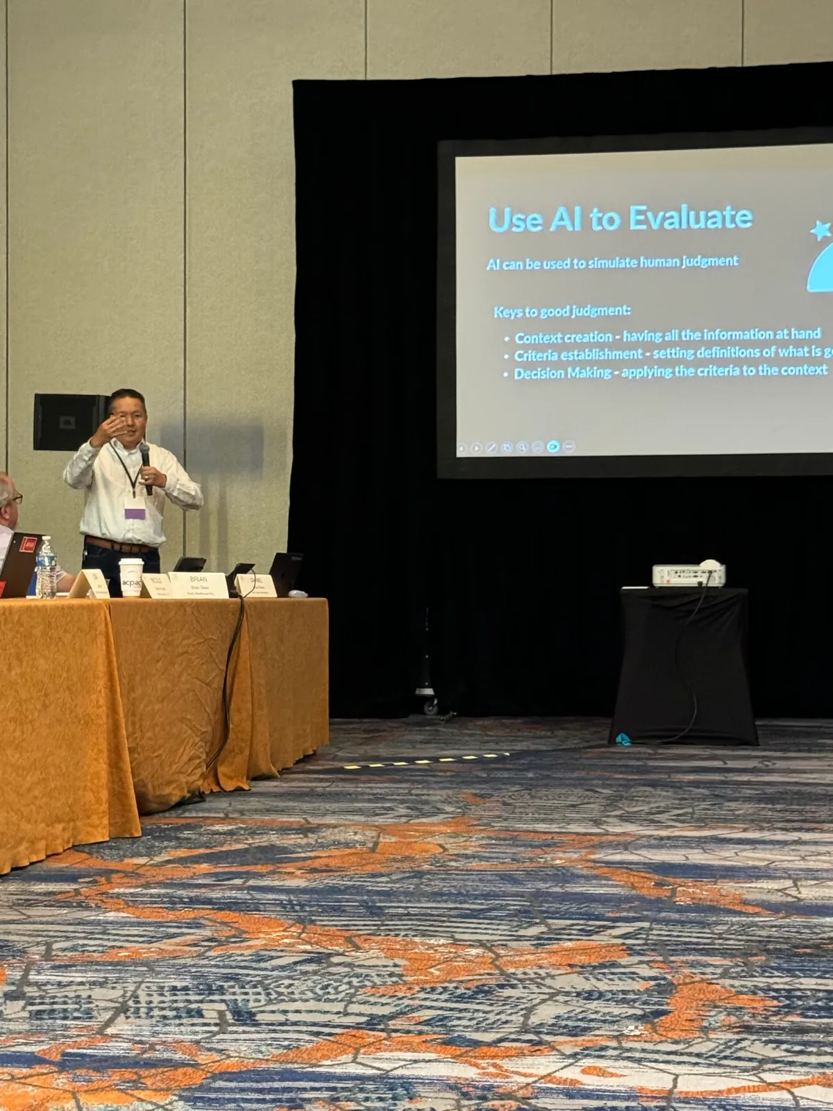 Lauren McCullough on a panel teaching how to use AI to evaluate